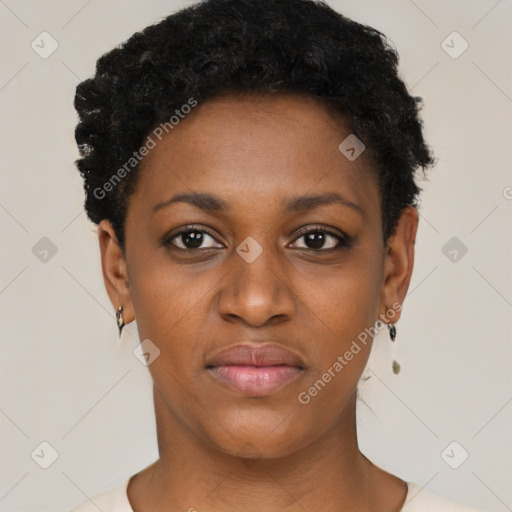 Joyful black young-adult female with short  black hair and brown eyes