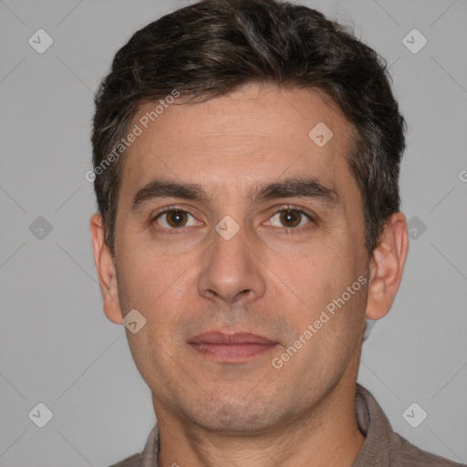 Neutral white adult male with short  brown hair and brown eyes