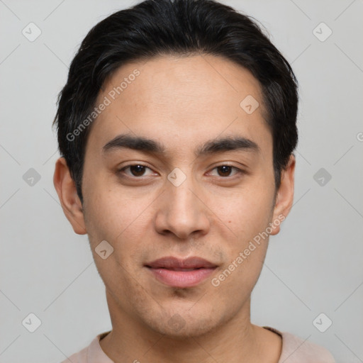 Joyful white young-adult male with short  black hair and brown eyes