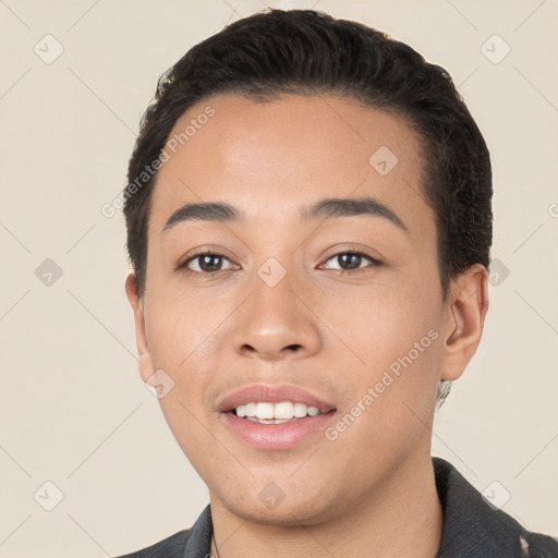 Joyful white young-adult male with short  black hair and brown eyes