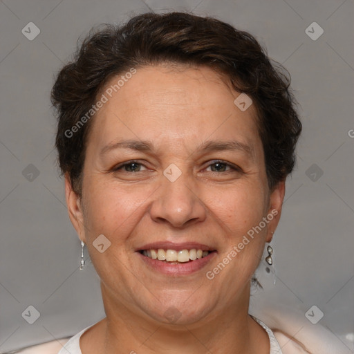 Joyful white adult female with short  brown hair and brown eyes