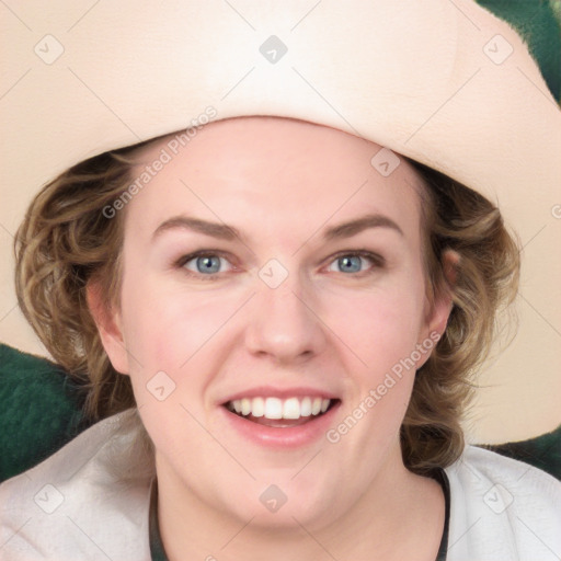 Joyful white young-adult female with medium  brown hair and blue eyes