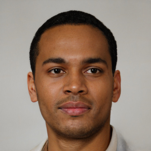 Neutral latino young-adult male with short  brown hair and brown eyes