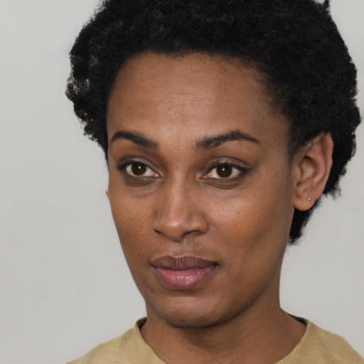 Neutral black young-adult female with short  black hair and brown eyes