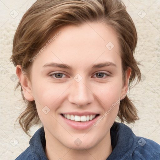 Joyful white young-adult female with medium  brown hair and blue eyes