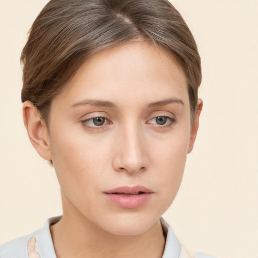 Neutral white young-adult female with short  brown hair and brown eyes