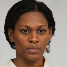 Neutral black young-adult female with short  brown hair and brown eyes