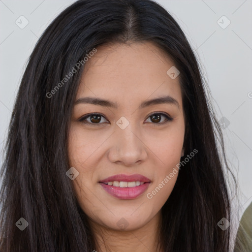 Joyful asian young-adult female with long  brown hair and brown eyes