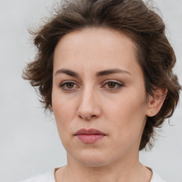 Neutral white young-adult female with short  brown hair and brown eyes