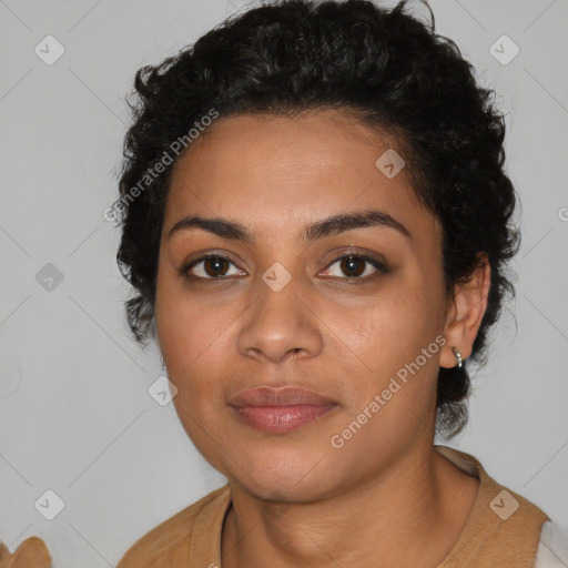 Joyful latino young-adult female with long  brown hair and brown eyes