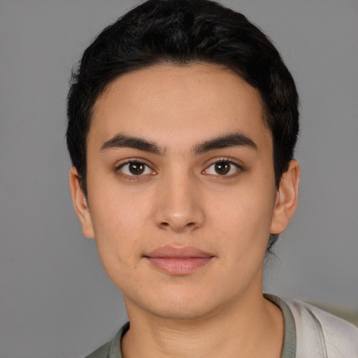 Neutral white young-adult male with short  black hair and brown eyes