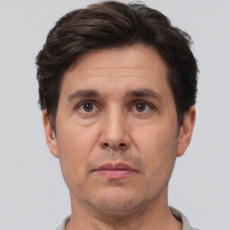 Neutral white adult male with short  brown hair and brown eyes