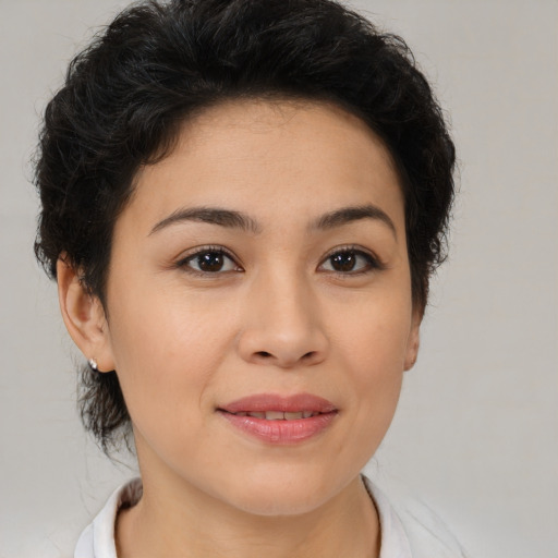 Joyful latino young-adult female with short  brown hair and brown eyes