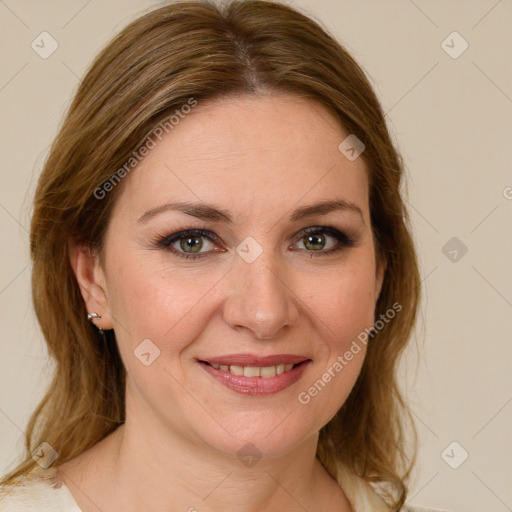 Joyful white young-adult female with medium  brown hair and green eyes