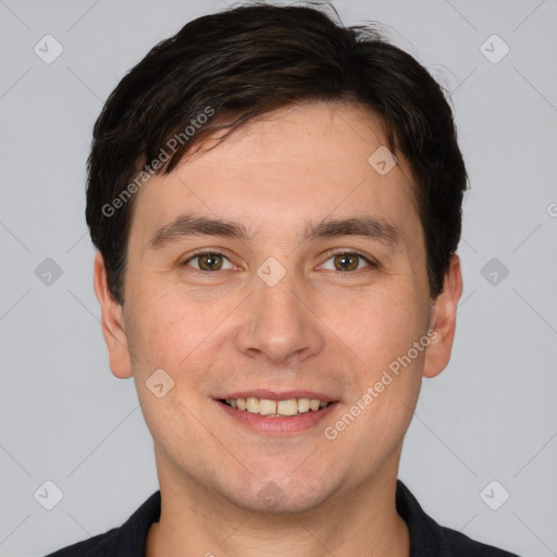 Joyful white young-adult male with short  brown hair and brown eyes