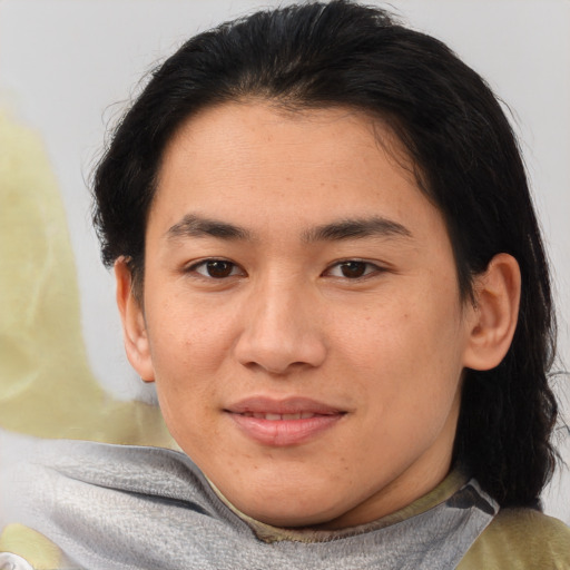 Joyful asian young-adult female with medium  brown hair and brown eyes