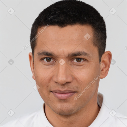 Joyful white adult male with short  brown hair and brown eyes