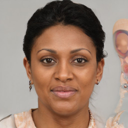 Joyful black young-adult female with short  brown hair and brown eyes