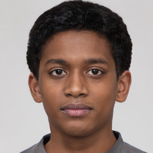 Neutral black young-adult male with short  black hair and brown eyes