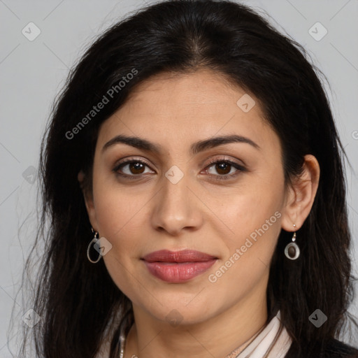 Joyful latino young-adult female with long  brown hair and brown eyes