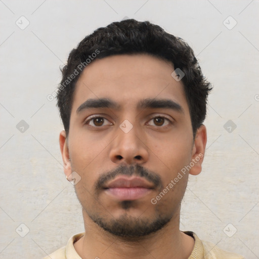 Neutral latino young-adult male with short  black hair and brown eyes