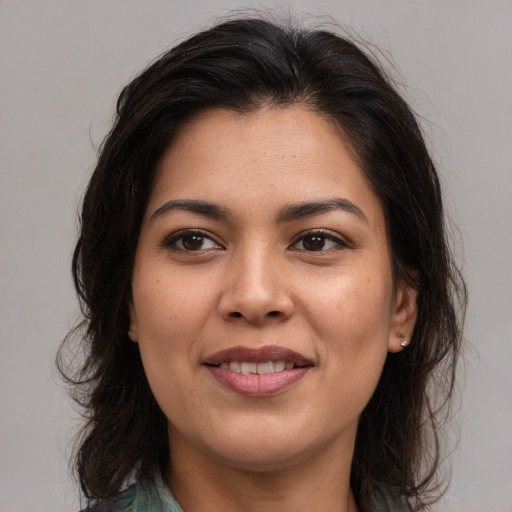 Joyful asian young-adult female with medium  brown hair and brown eyes