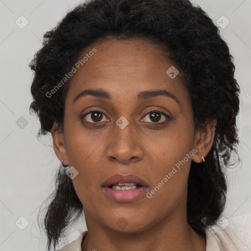 Neutral black young-adult female with long  brown hair and brown eyes