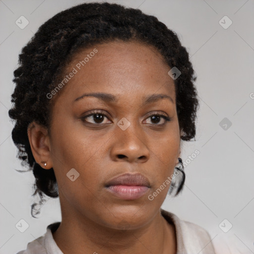 Neutral black young-adult female with short  brown hair and brown eyes