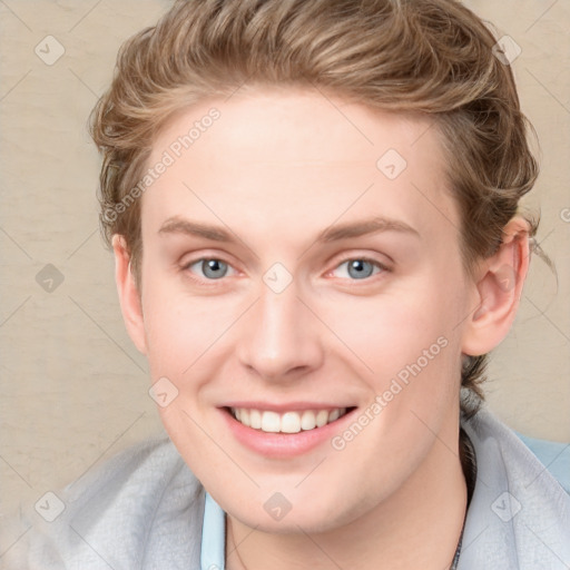 Joyful white young-adult female with short  brown hair and blue eyes