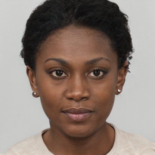 Neutral black young-adult female with short  black hair and brown eyes
