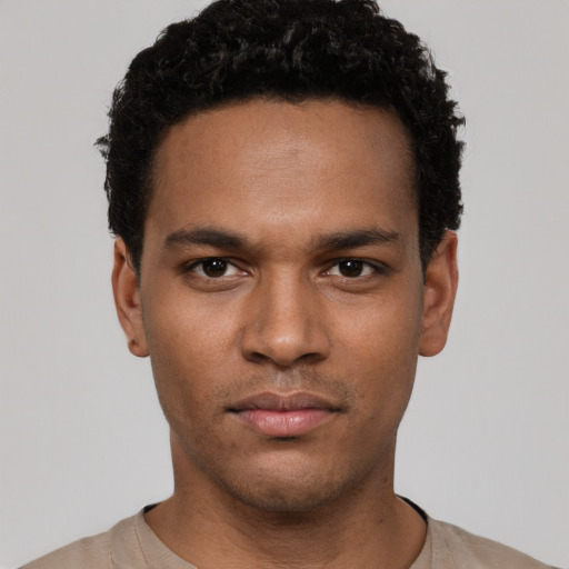 Neutral white young-adult male with short  black hair and brown eyes
