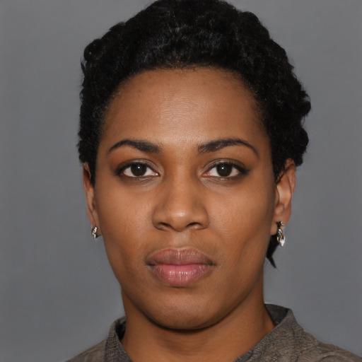 Neutral black young-adult female with short  black hair and brown eyes