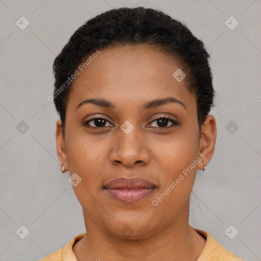 Joyful black young-adult female with short  brown hair and brown eyes