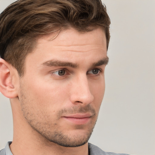 Neutral white young-adult male with short  brown hair and grey eyes