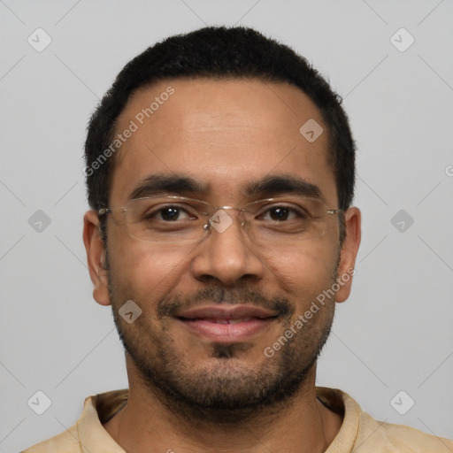 Joyful latino young-adult male with short  black hair and brown eyes