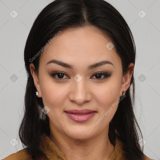 Joyful latino young-adult female with long  brown hair and brown eyes