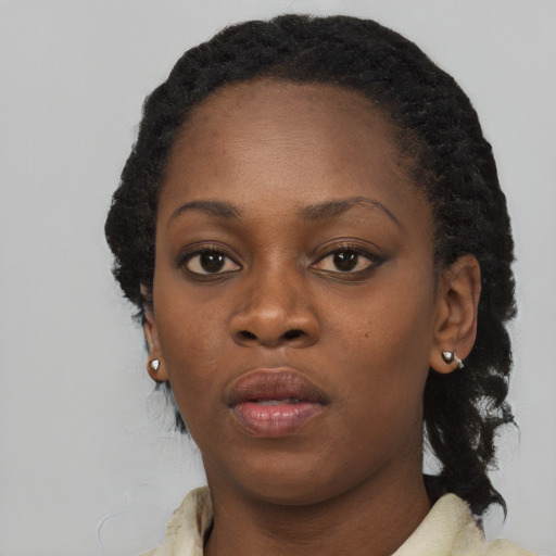 Neutral black adult female with medium  black hair and brown eyes
