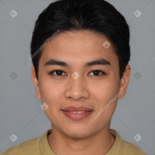 Joyful asian young-adult male with short  brown hair and brown eyes