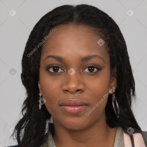 Joyful black young-adult female with long  black hair and brown eyes