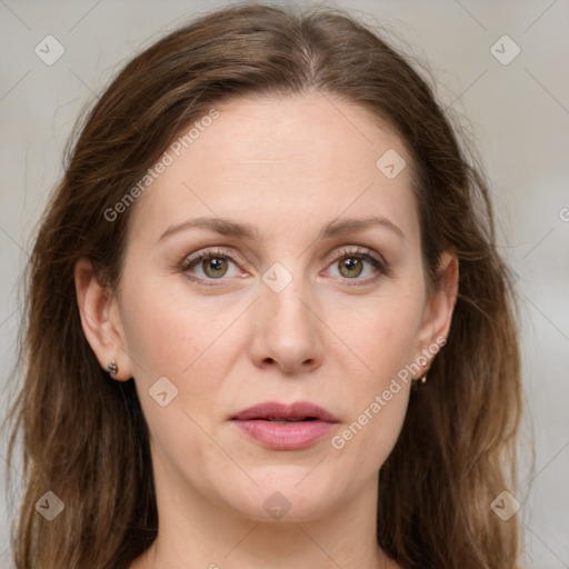 Joyful white young-adult female with long  brown hair and green eyes