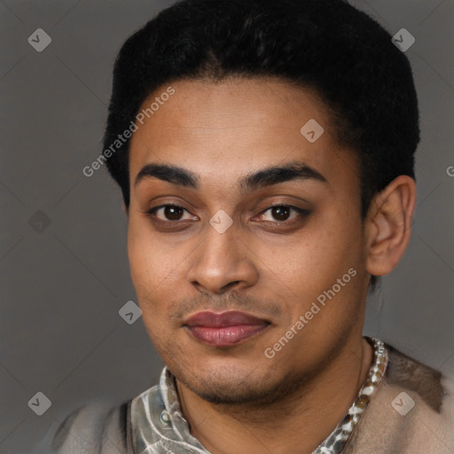 Joyful black young-adult male with short  black hair and brown eyes