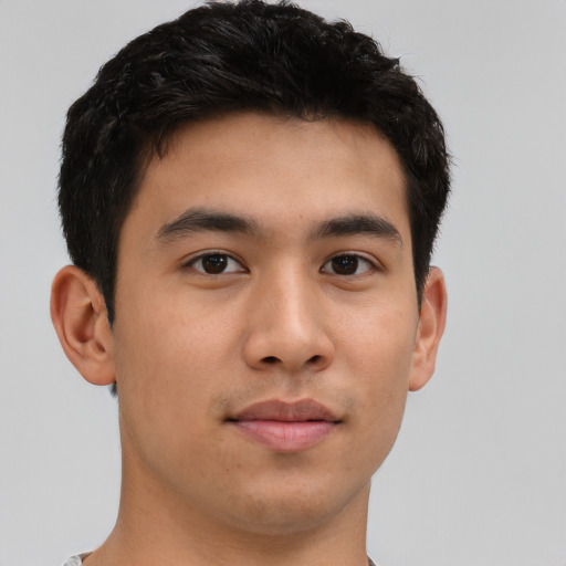 Neutral asian young-adult male with short  brown hair and brown eyes