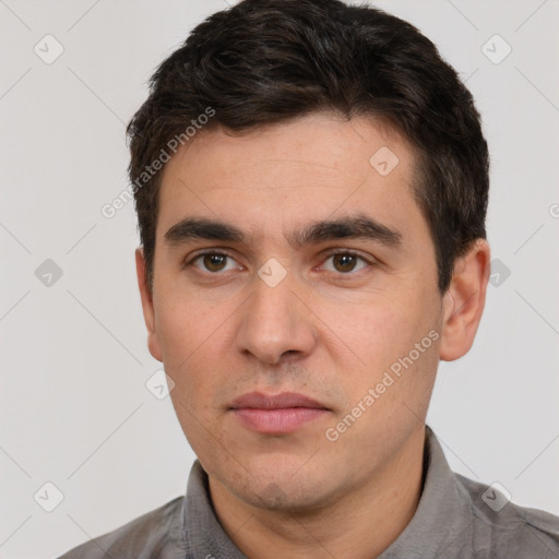 Neutral white young-adult male with short  brown hair and brown eyes