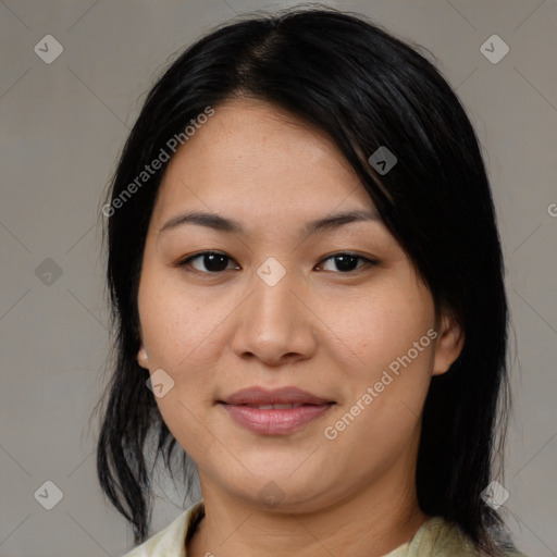 Joyful asian young-adult female with medium  black hair and brown eyes