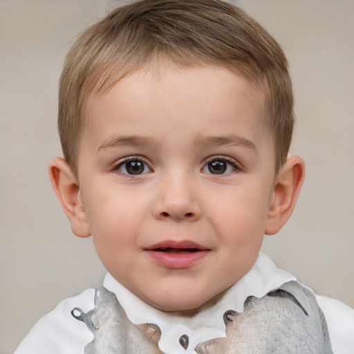 Joyful white child male with short  brown hair and brown eyes