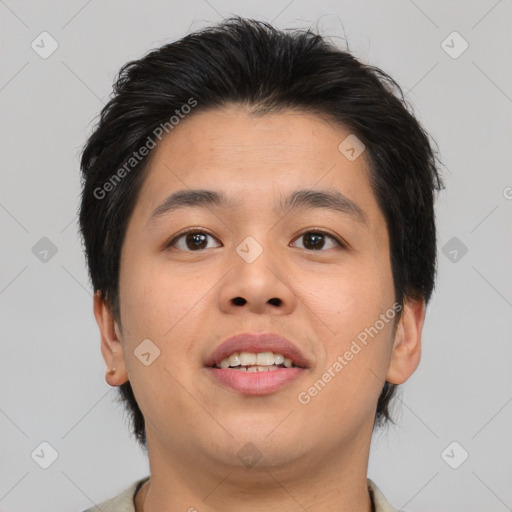 Joyful asian young-adult male with short  brown hair and brown eyes