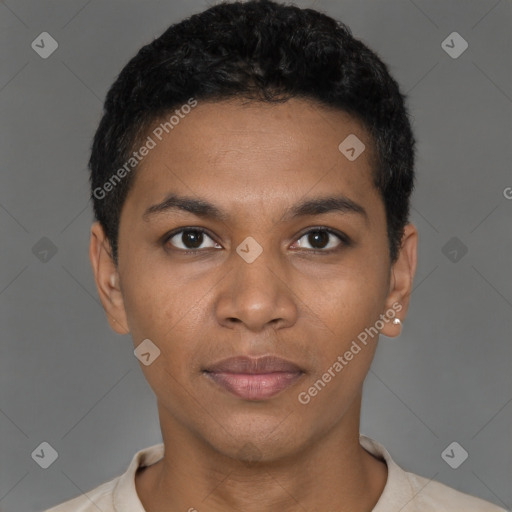 Joyful black young-adult male with short  black hair and brown eyes