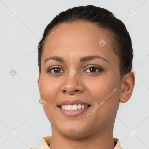 Joyful white young-adult female with short  brown hair and brown eyes