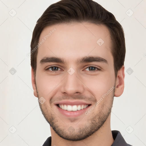 Joyful white young-adult male with short  brown hair and brown eyes