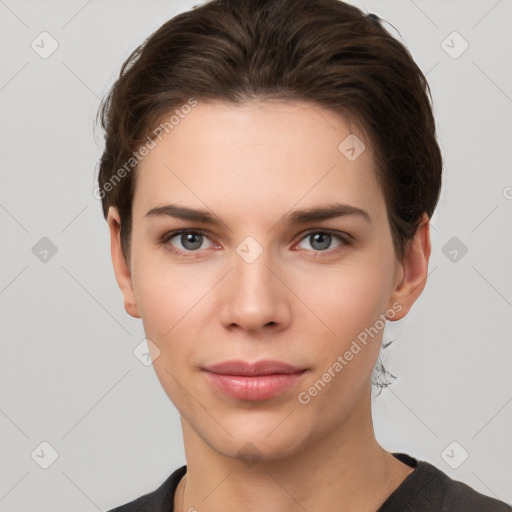 Neutral white young-adult female with short  brown hair and brown eyes